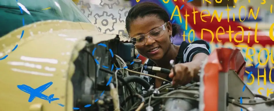 A woman working on a machine.